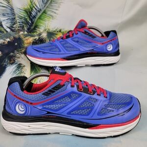 Women’s light weight athletic shoes; eye-catching blue with deep pink accents.